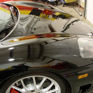 Hood Reflection In Shop