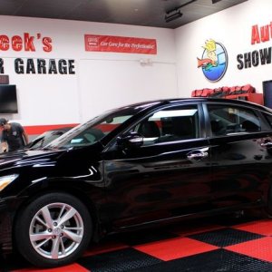 Black BMW Z3 and Black Nissan Altima Detailing Black Paint