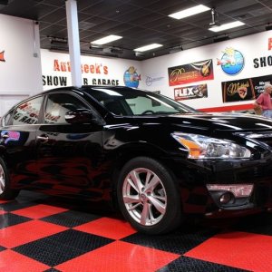 Black BMW Z3 and Black Nissan Altima Detailing Black Paint