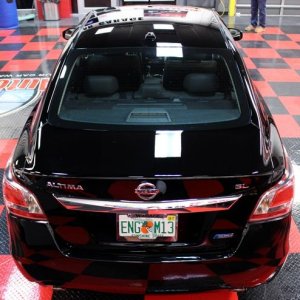 Black BMW Z3 and Black Nissan Altima Detailing Black Paint
