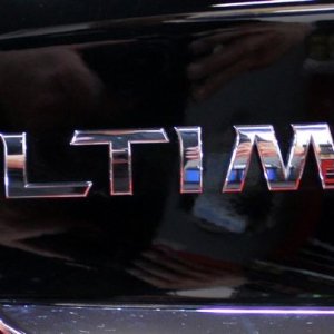 Black BMW Z3 and Black Nissan Altima Detailing Black Paint