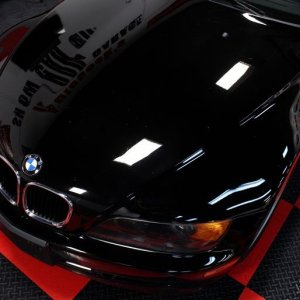 Black BMW Z3 and Black Nissan Altima Detailing Black Paint