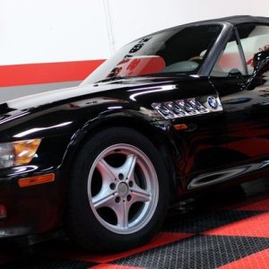 Black BMW Z3 and Black Nissan Altima Detailing Black Paint