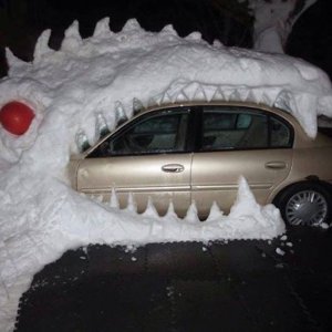 snow-sculpture-art-snowman-winter-6_605