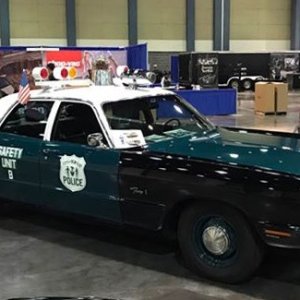 AJ in Jim Serras Patrol Car
