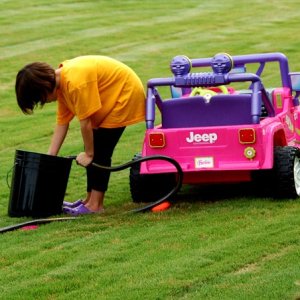 Jenna_washing_jeep-small