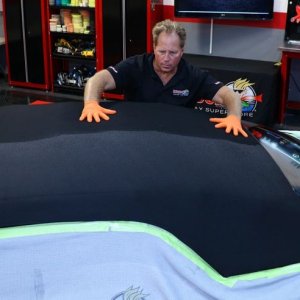The correct way to apply RaggTopp Canvas Top Protectant to a canvas convert