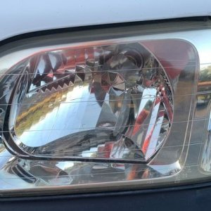 Headlight Correction - Wetsanding versus just Buffing - Results One Year La