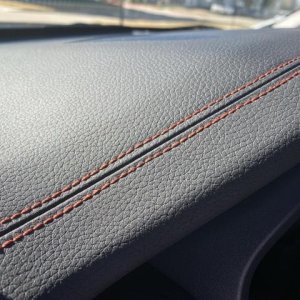 stained orange stitching