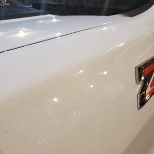 2021 Chevy Silverado with stains in white paint