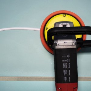 Picking up a bead of product with a rotary buffer