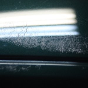 Looks like fiberglass after the gelcoat is worn