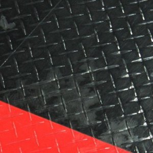 Waxing RaceDeck Tiles at Autogeek.net
