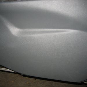 Lower grey panel on door after protectant has dried