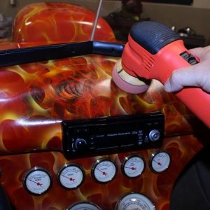Machine waxing a car dash by Mike Phillips