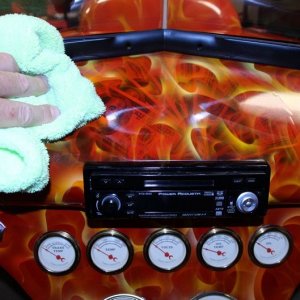 Machine waxing a car dash by Mike Phillips