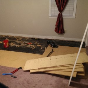 Ripping out particle board - first room