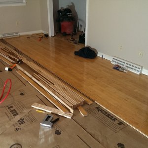 laying down floor in first room