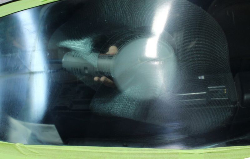 Black BMW Z3 and Black Nissan Altima Detailing Black Paint