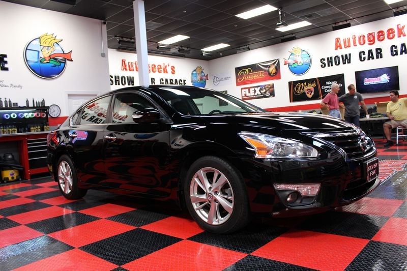 Black BMW Z3 and Black Nissan Altima Detailing Black Paint