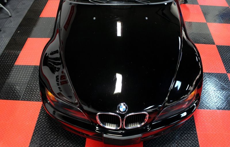 Black BMW Z3 and Black Nissan Altima Detailing Black Paint