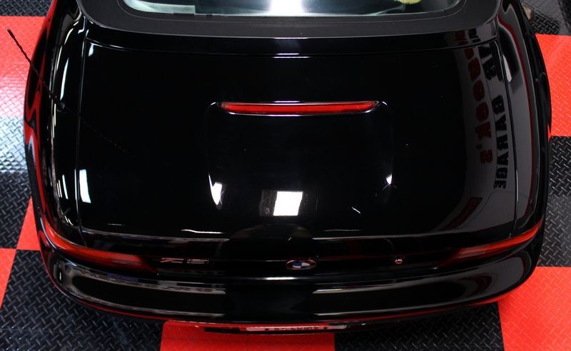 Black BMW Z3 and Black Nissan Altima Detailing Black Paint