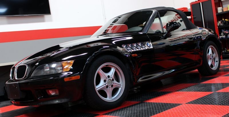 Black BMW Z3 and Black Nissan Altima Detailing Black Paint