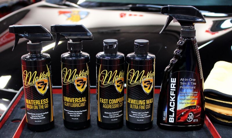 Black BMW Z3 and Black Nissan Altima Detailing Black Paint