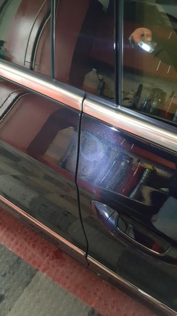 Buffed through the clearcoat to expose the basecoat