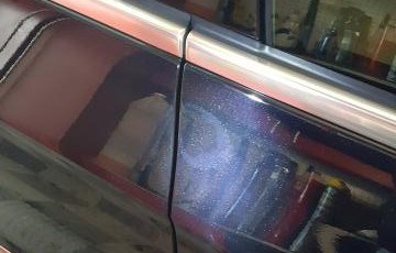 Buffed through the clearcoat to expose the basecoat