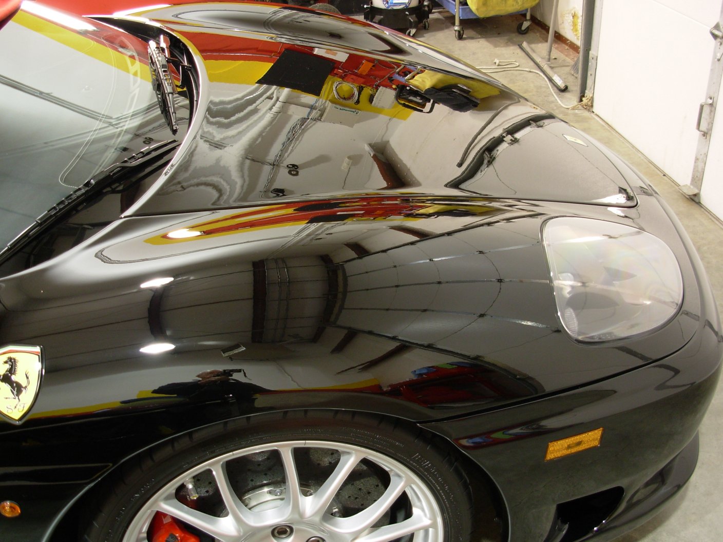 Hood Reflection In Shop