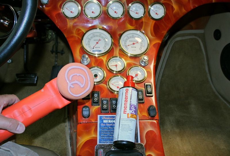 Machine waxing a car dash by Mike Phillips
