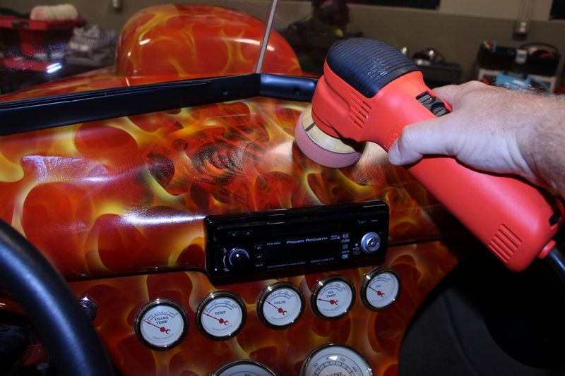 Machine waxing a car dash by Mike Phillips