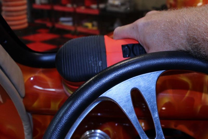 Machine waxing a car dash by Mike Phillips