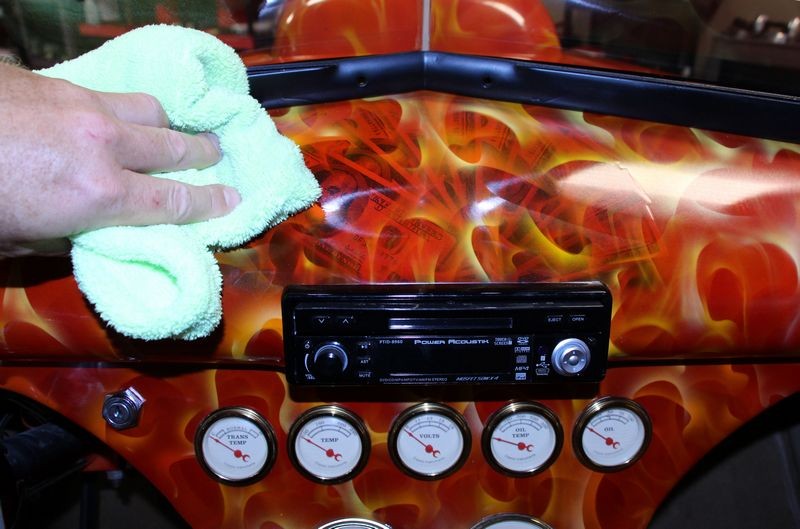 Machine waxing a car dash by Mike Phillips