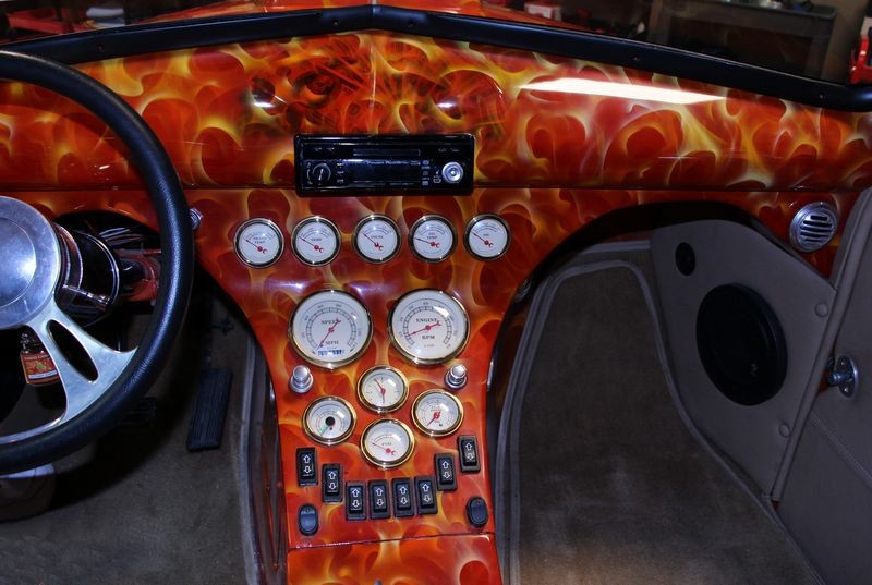 Machine waxing a car dash by Mike Phillips