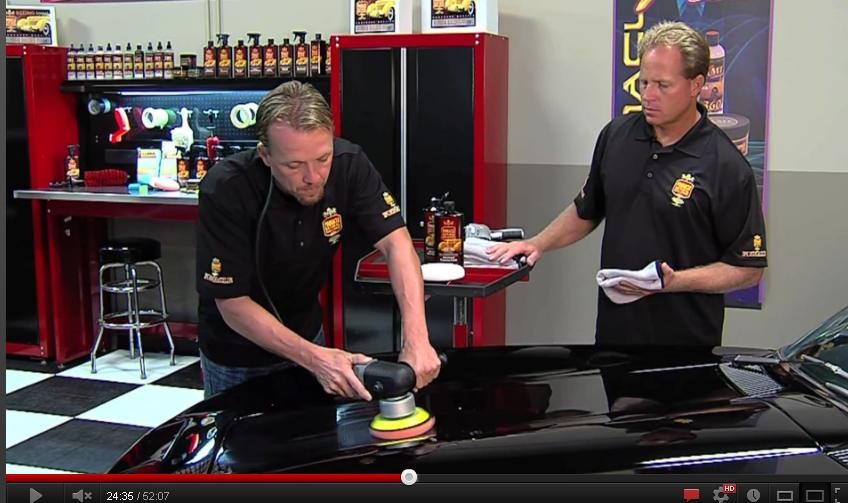 Matt Steele and Mike Phillips buffing out a 1966 Corvette