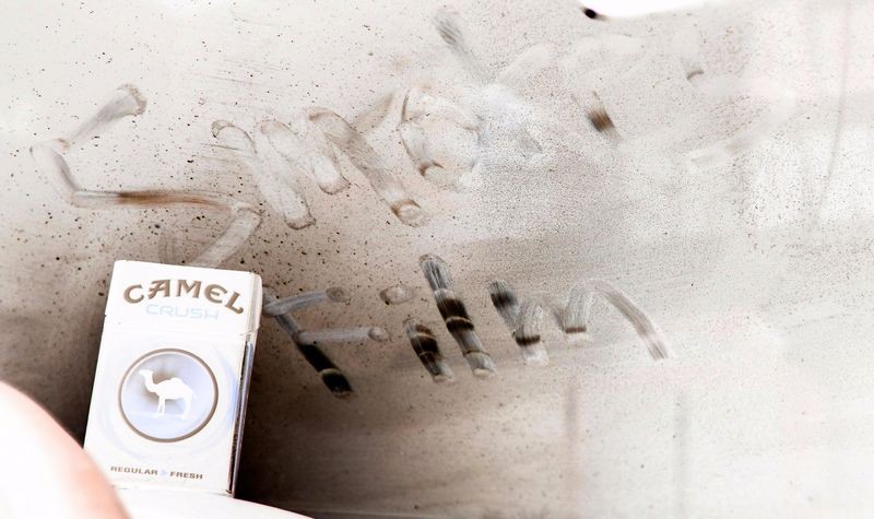 Negative Version How to remove Smokers Film off inside of windshield