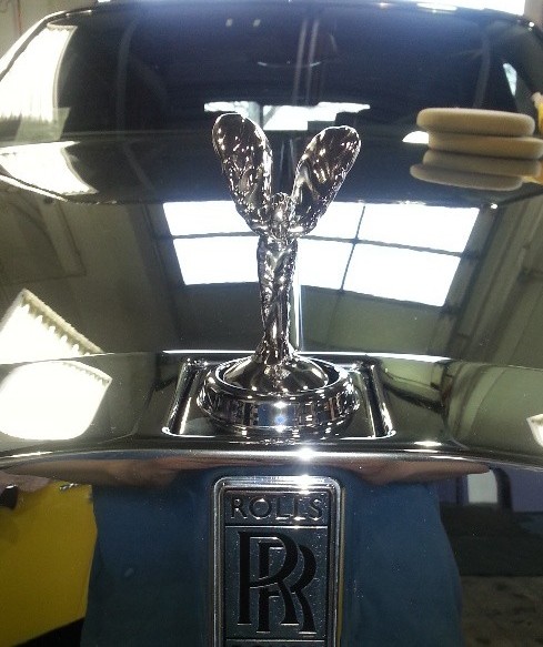 Polishing a Rolls Royce