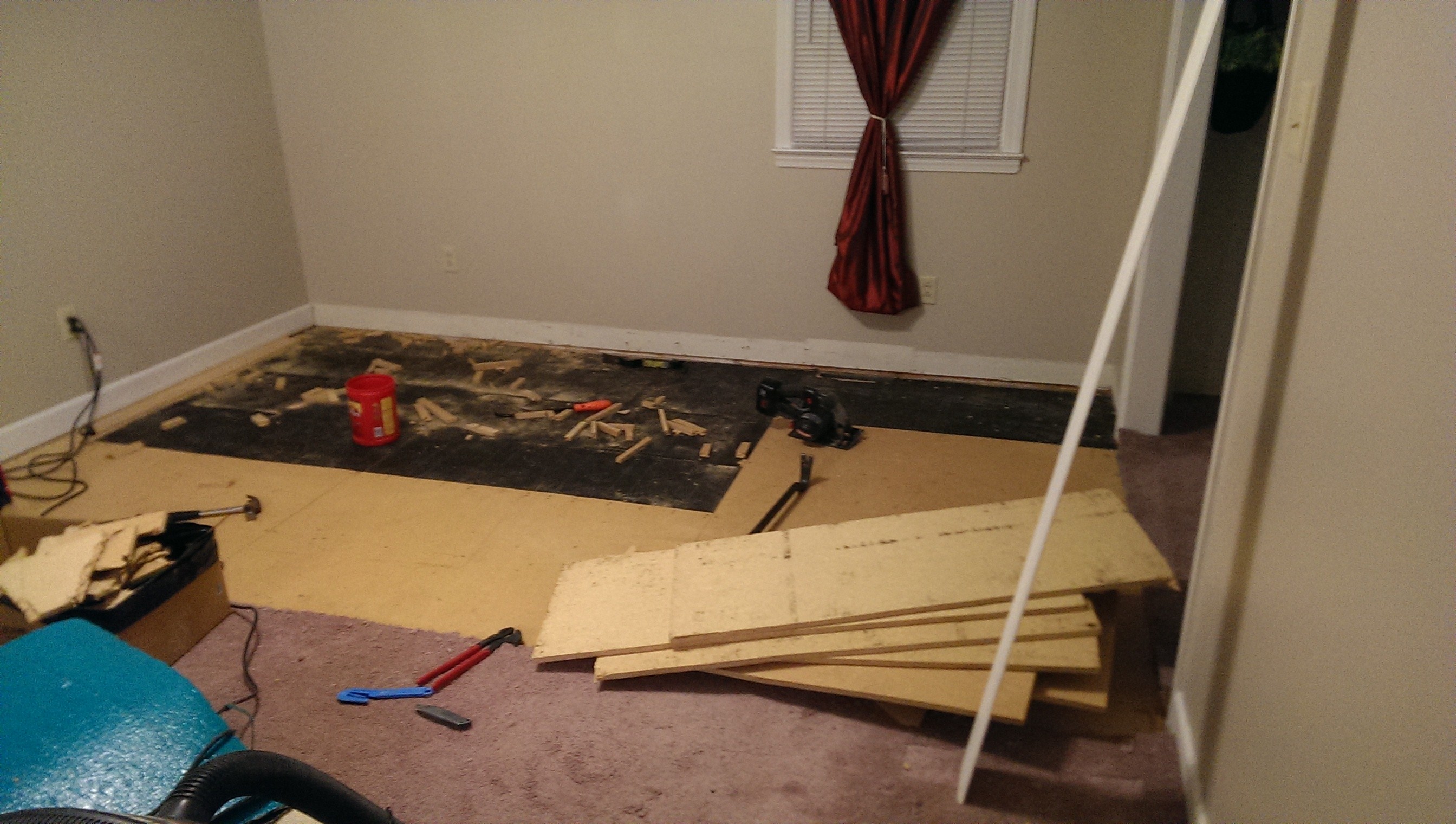 Ripping out particle board - first room