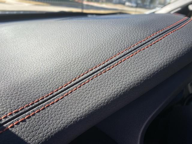 stained orange stitching