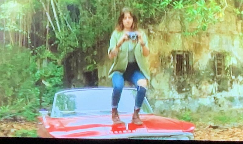 standing on the hood of a classic car - LOSER