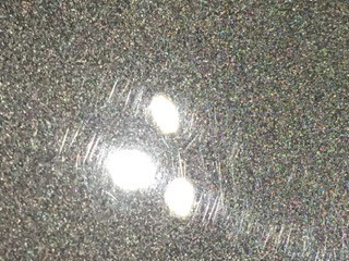 tiny pits in car paint
