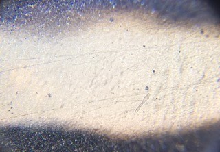 tiny pits in car paint