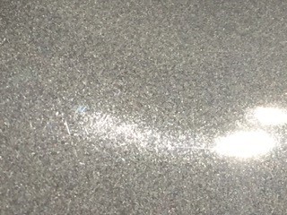 tiny pits in car paint