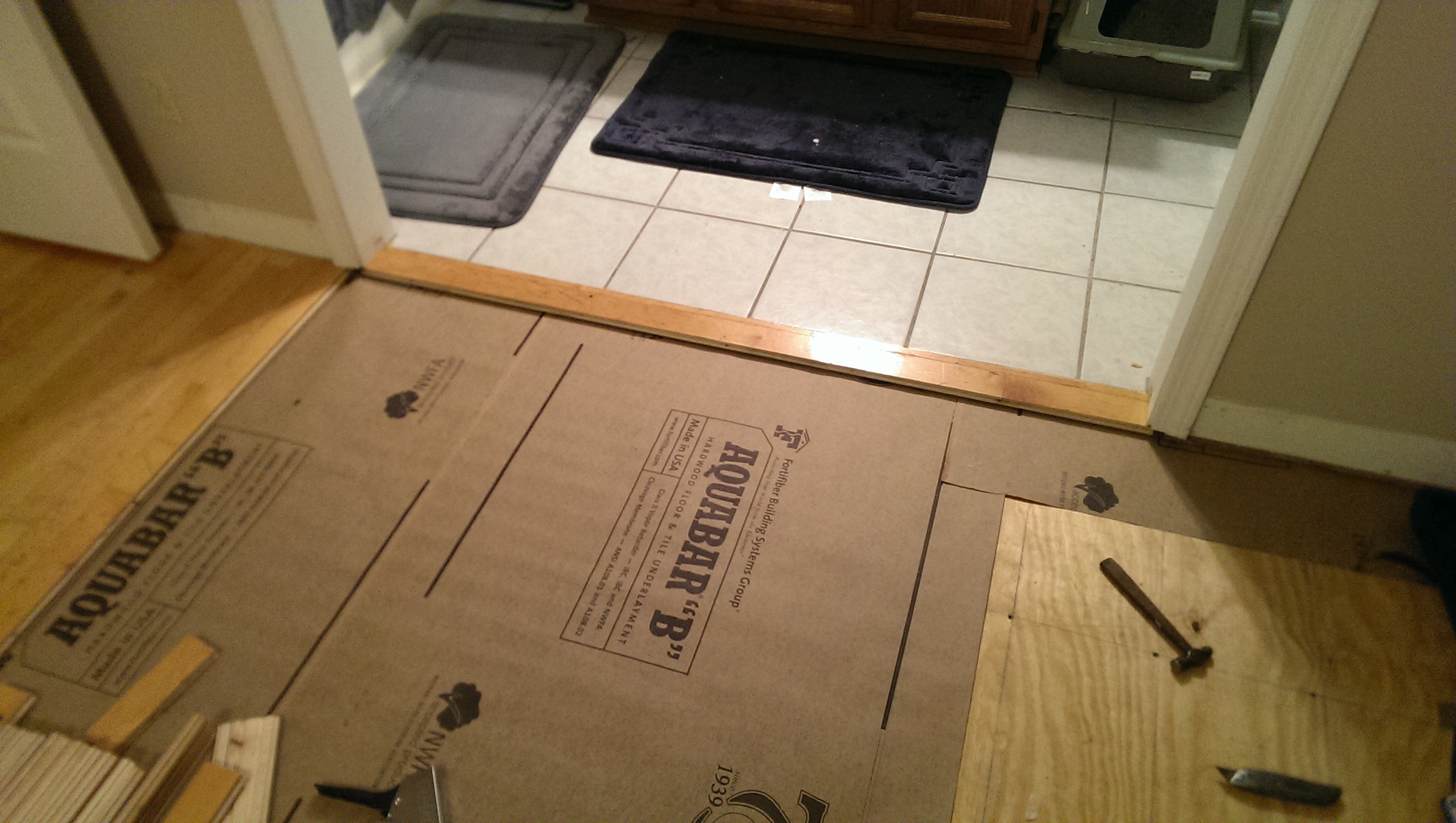 Working across transition to bathroom in first room